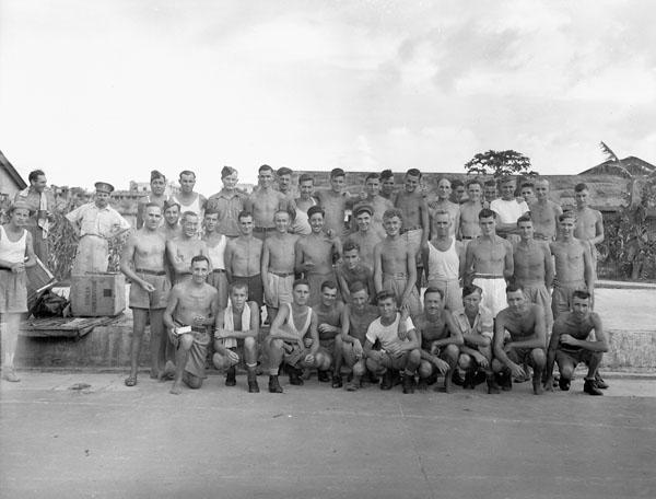 Canadian and British soldiers in a POW Camp