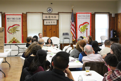 Attendees listen to two speakers at Pacific Atrocities Education Summer Showcase and Fundraiser event