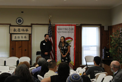 Individuals speak at Pacific Atrocities Education Summer Showcase and Fundraiser event